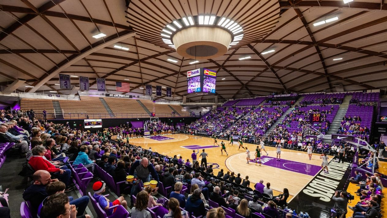 A wide angle shot of the Chiles Center, UP's indoor sports arena.