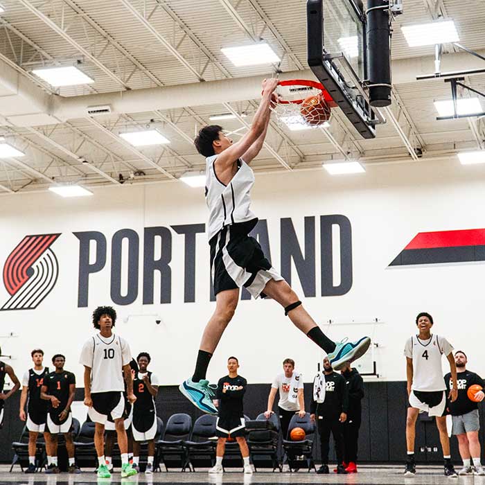 basketball player dunks