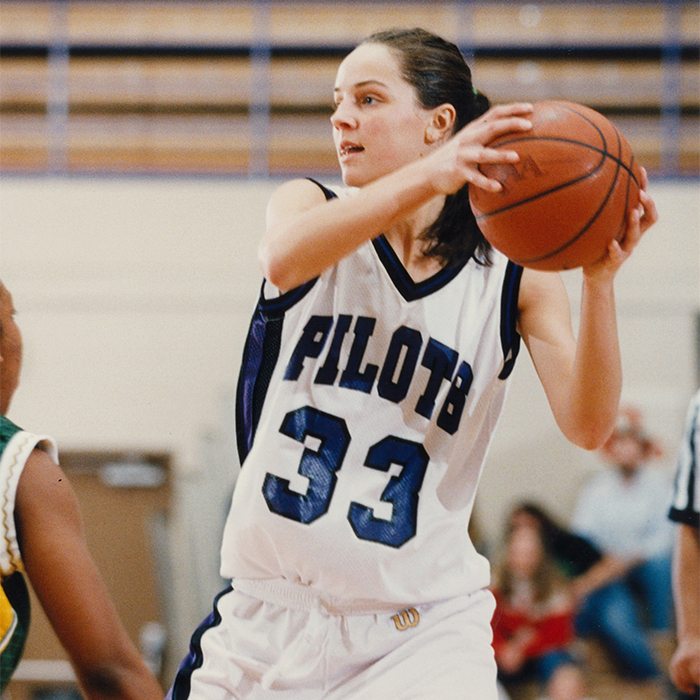 Kristen Heppner plays basketball