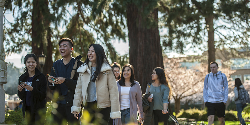 students walking outside on University of Portland campus