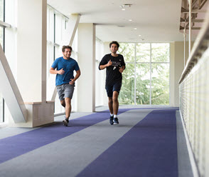 Joggers on the indoor track