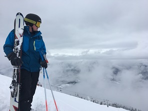 a skier standing on a slope