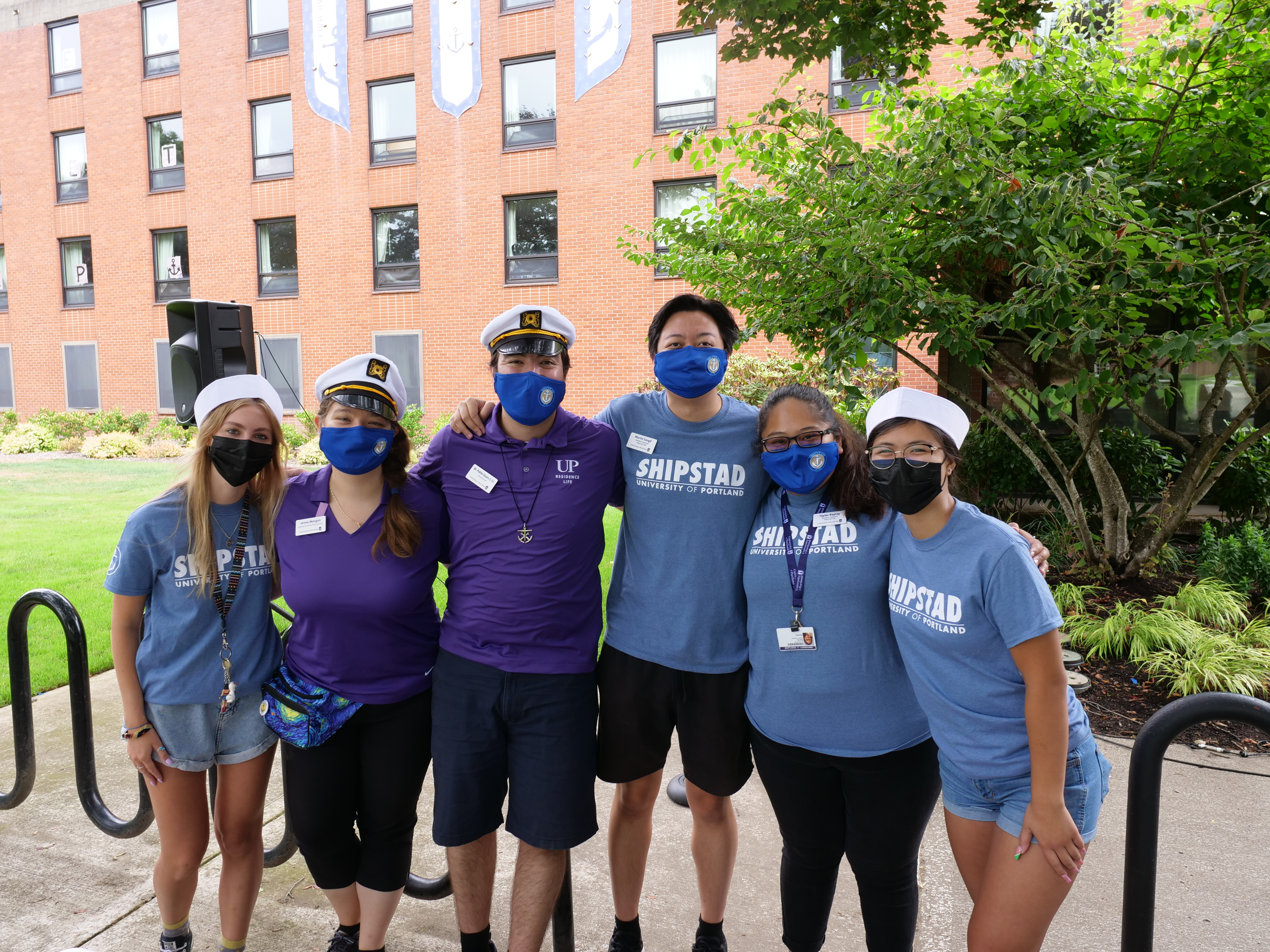 Image of Shipstad Hall Director and students