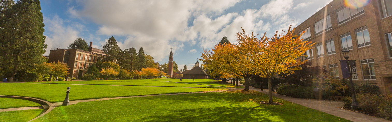 Academic quad with Shiley, bell tower and chapel in the fall.