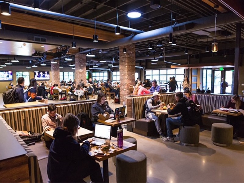 Wide shot of the interior of the Pilot House showing both the lounge and main dining area.