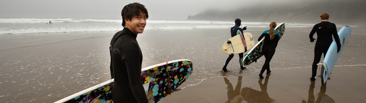 Students with surfboards